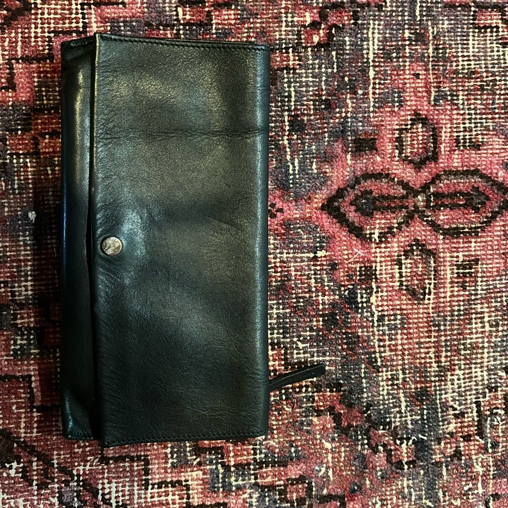 Shinola black clutch.